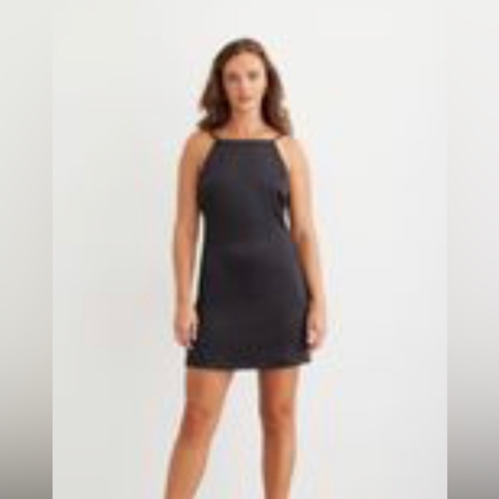 Black satin high neck open back dress. Never worn. Tags on